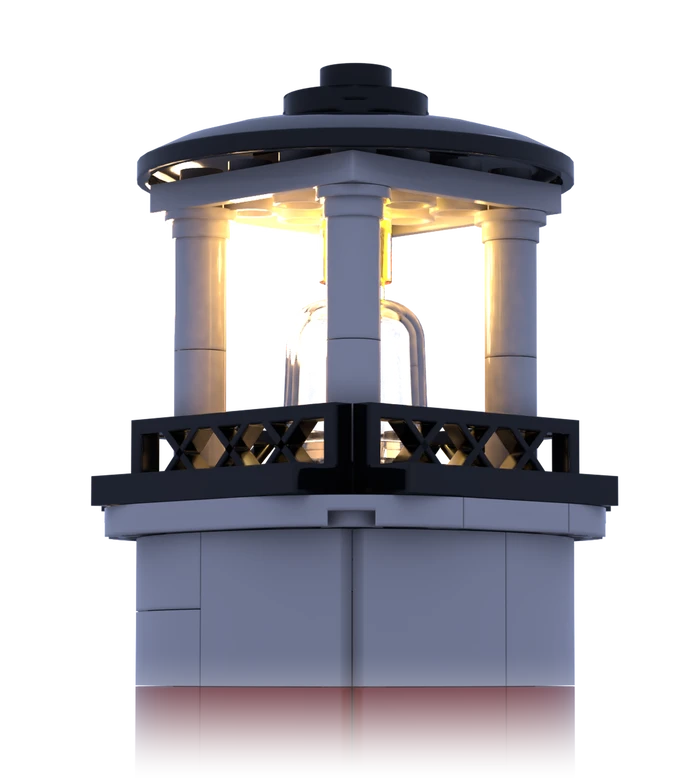 The lantern room of a lighthouse built from genuine LEGO® bricks, seen close, its lamp lit.