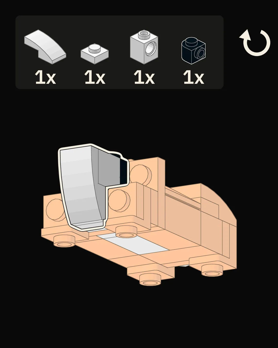 Step 6 of 18: Seen from below: add the white parts and the black brick at the front.